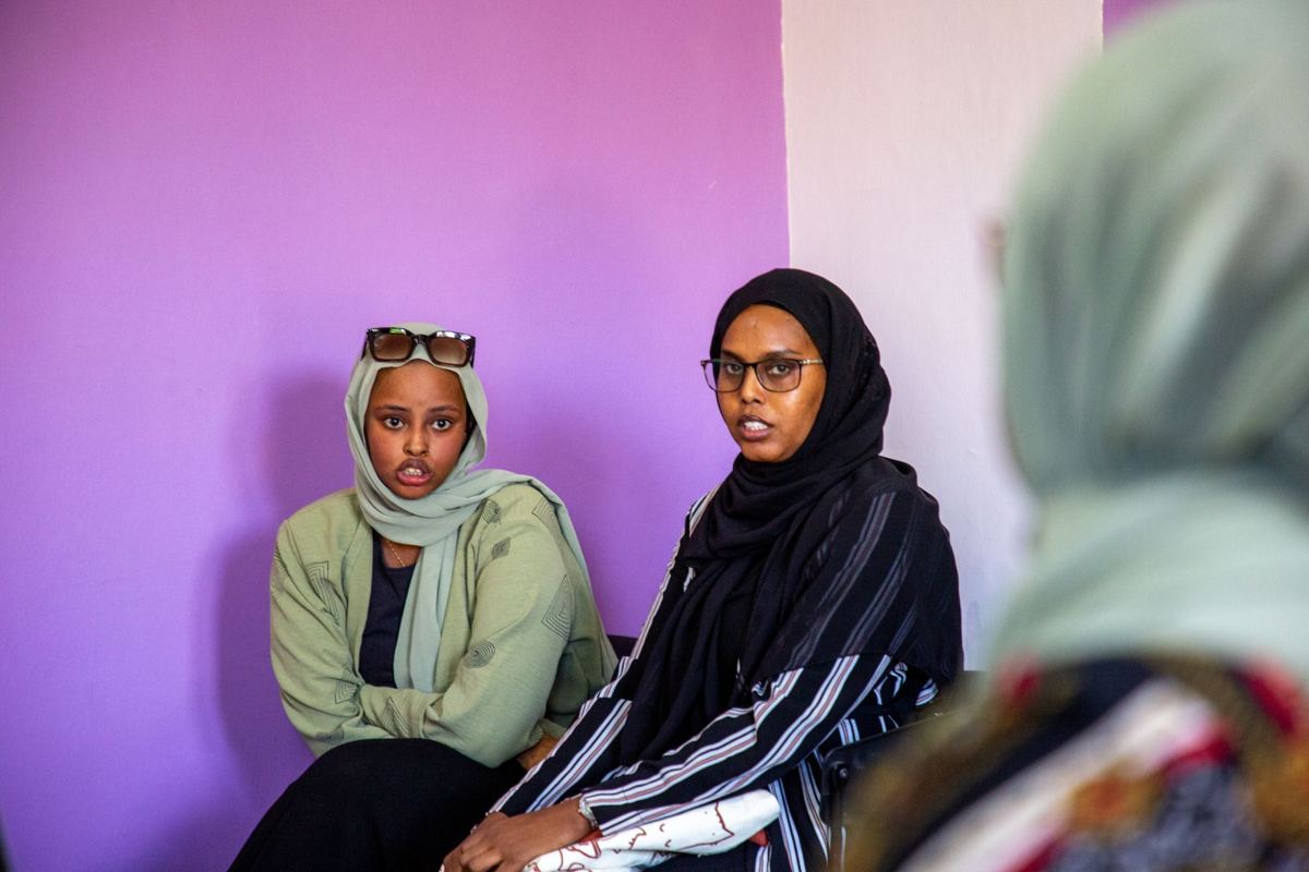 Two young women at a YEEL event